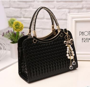 Luxury simple shells leather handbag female tide knitting shoulder bag